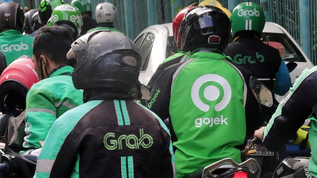 Softbank Tekan Grab Agar Merger dengan Gojek